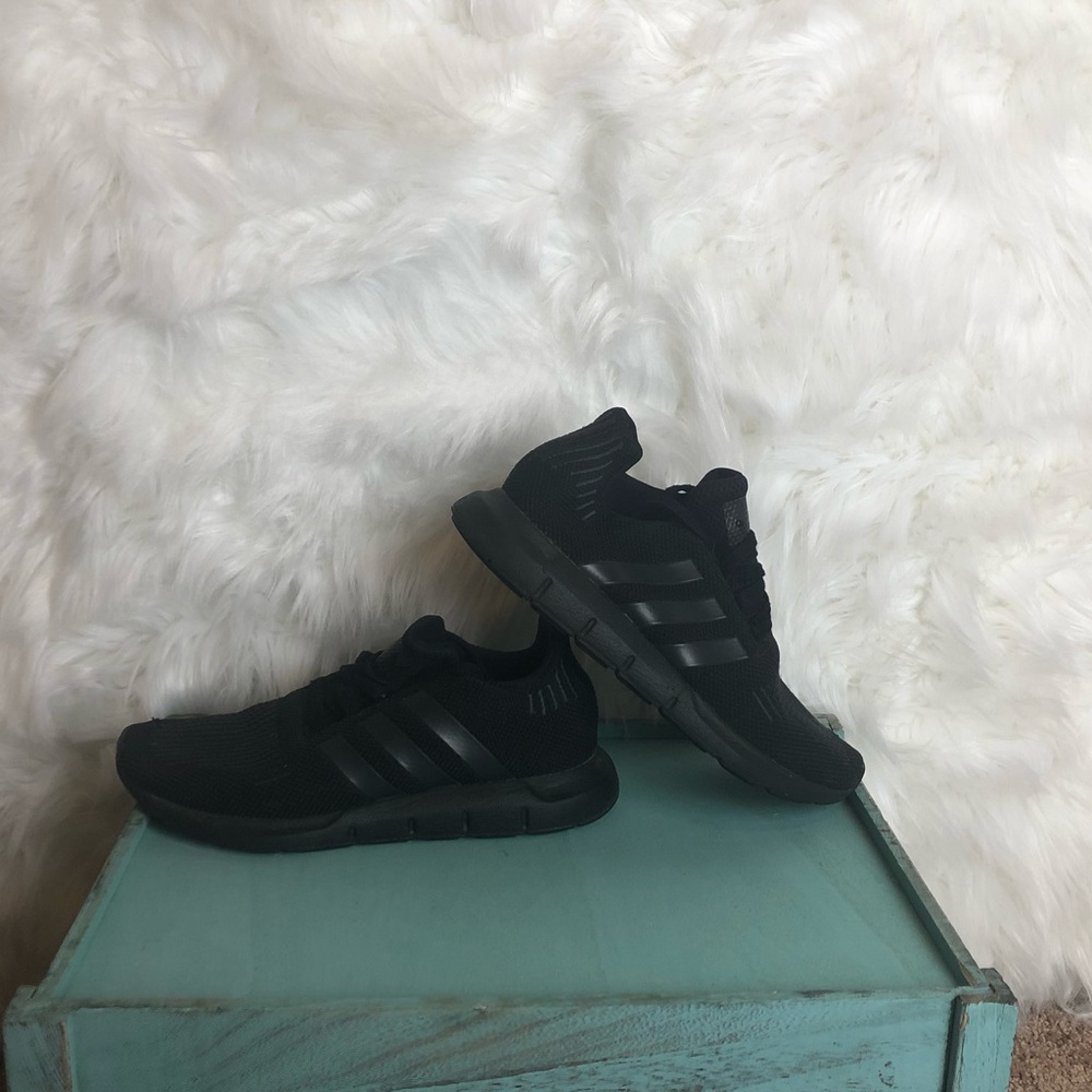 Boys black Adidas shoes